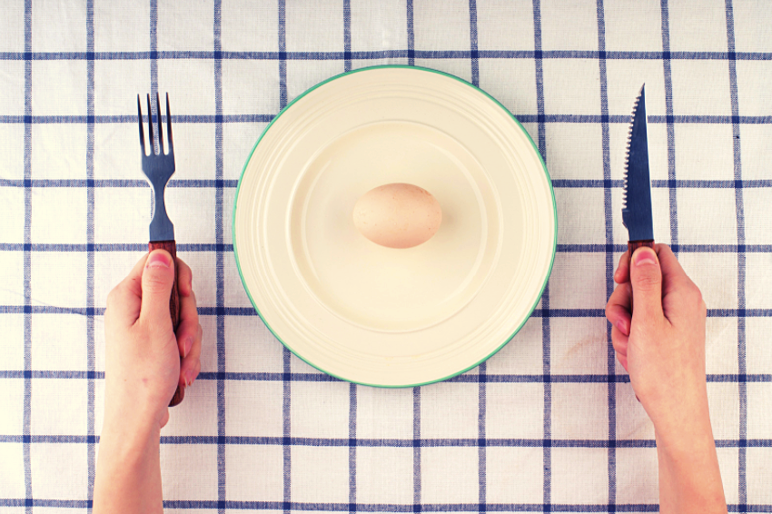single egg on plate